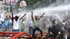 India police clash with protestors over jobs and exam transparency