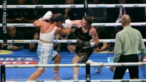 Taylor beats Pili by unanimous decision to bow out as undisputed champion.